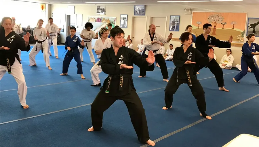 Benefits of Learning Martial Arts for Self Defense Person practicing martial arts techniques for self-defense in a training setting