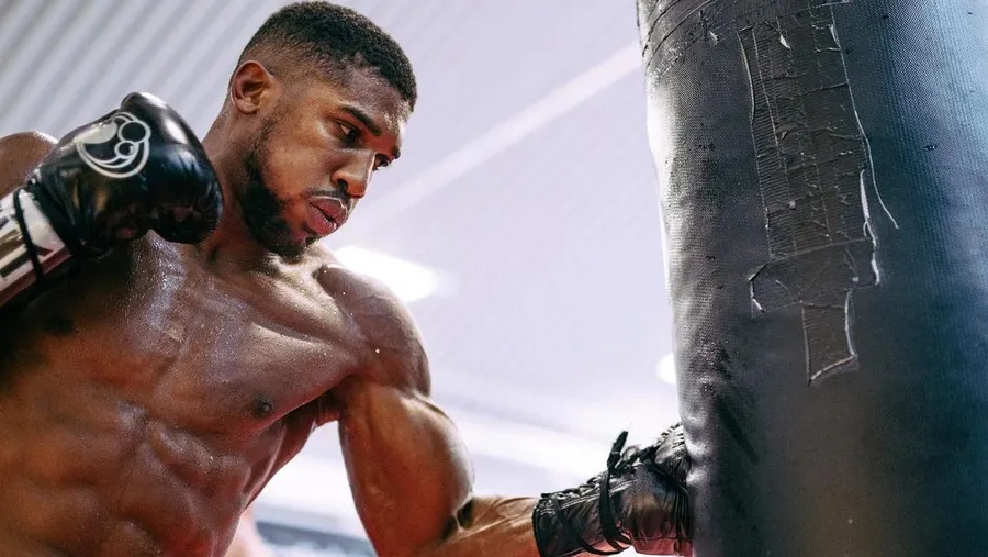Boxer throwing fast powerful punch